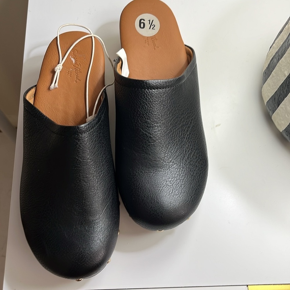 New 
No Flaws
Size 6 1/2
Black Faux Leather Clogs with Studded Detail